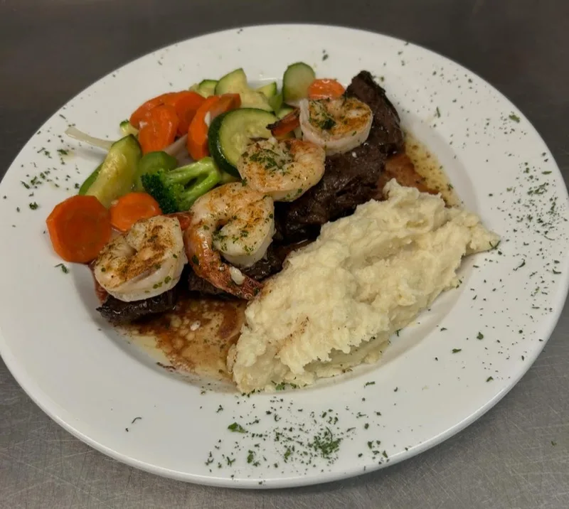 Surf n Turf with shrimp, steak and mashed potatoes