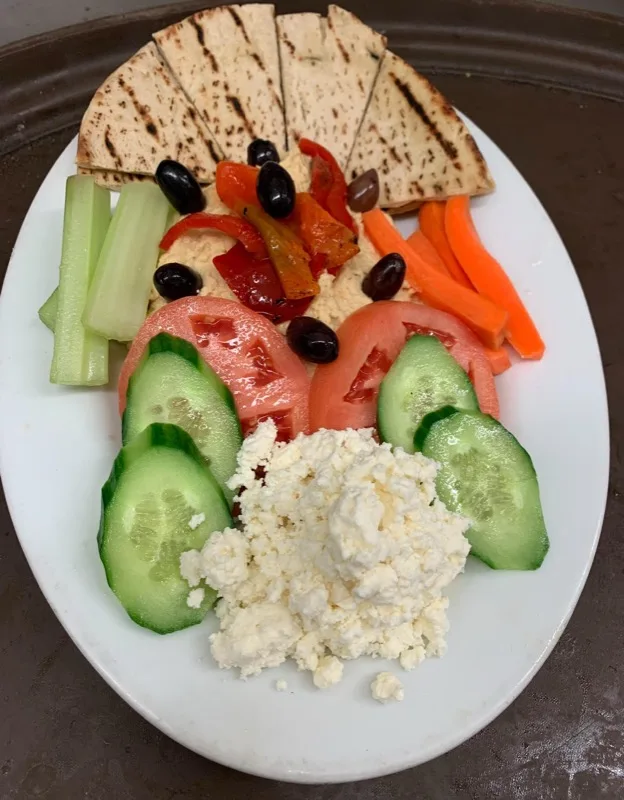 Greek Hummus Plate with pita, vegetables and feta